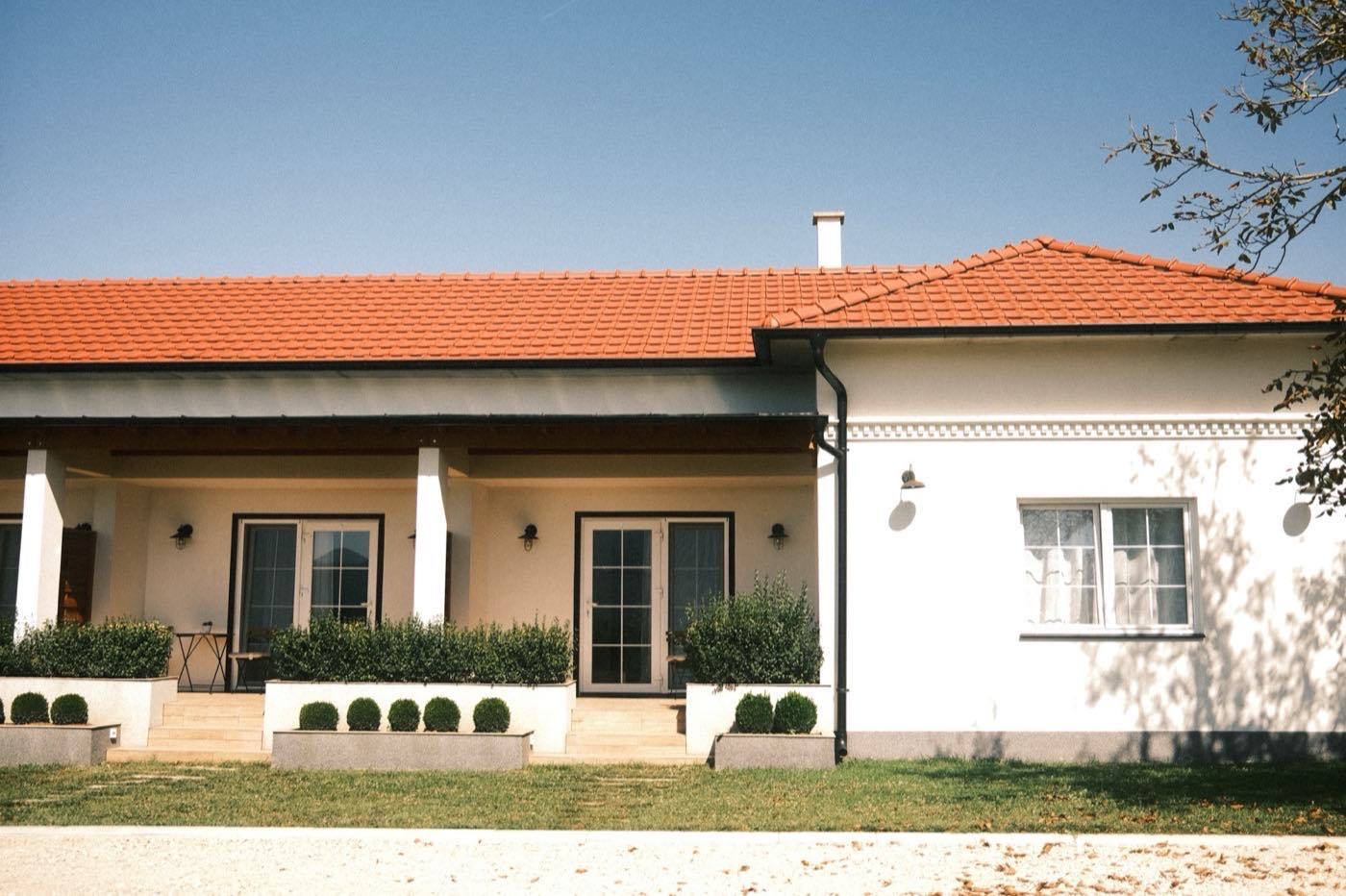 A modern house exterior, illustrating property development website design