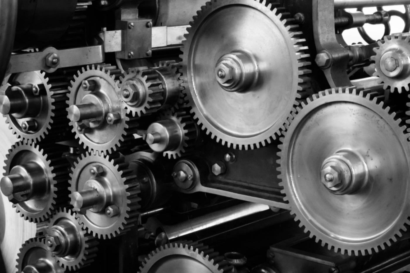 Interlocking machine gears, illustrating small business workflow automation